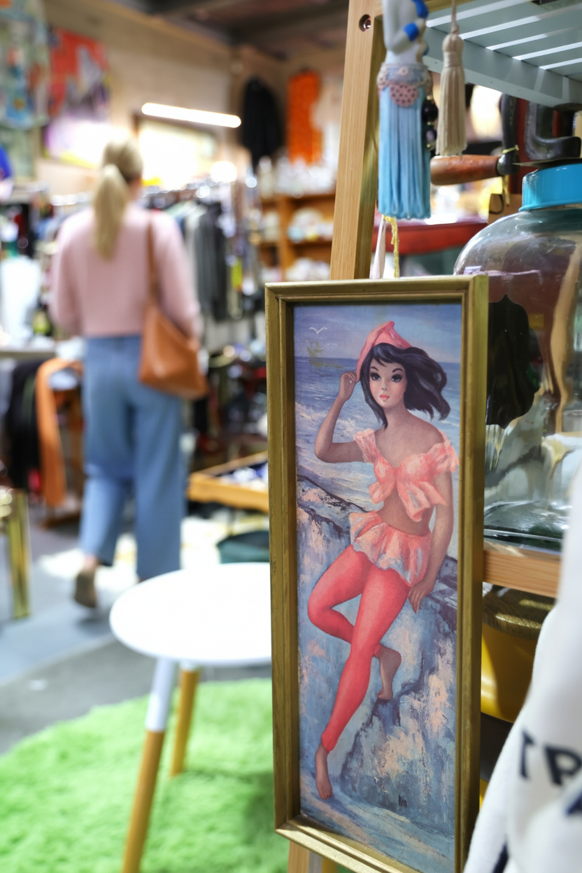 Boutique background with blond woman in background
